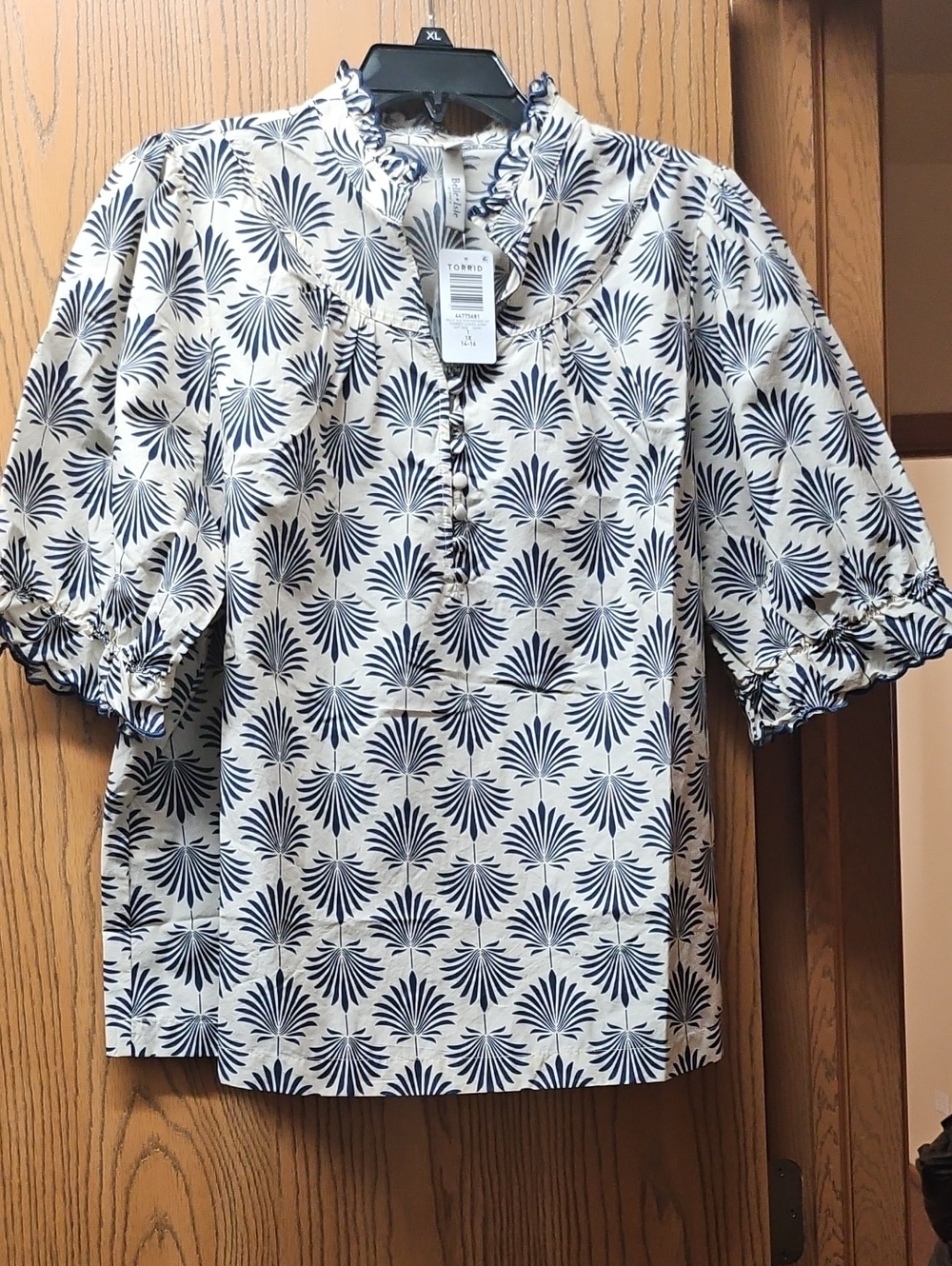 torrid navy and cream fan-print ruffle-neck blouse